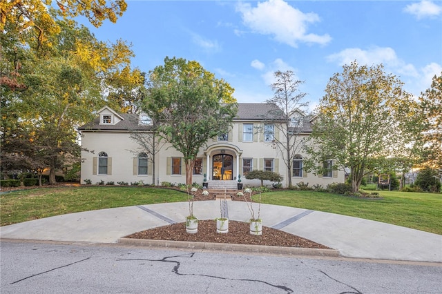 view of front of property with a front lawn