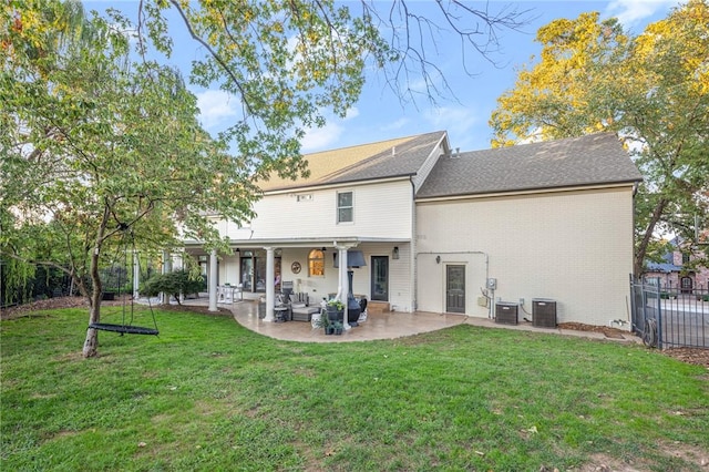 16 W Wimbledon Way, Rogers, AR 72758 - rear view of house featuring a lawn, a patio area, brick siding, fence, and cooling unit