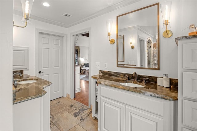 16 W Wimbledon Way, Rogers, AR 72758 - bathroom with a sink, crown molding, and two vanities