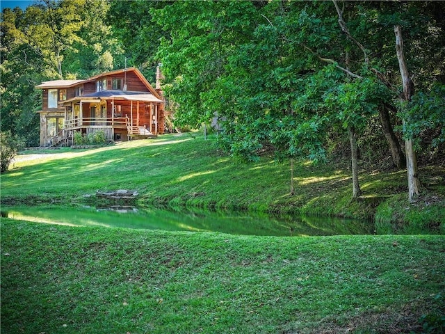 view of yard with a water view