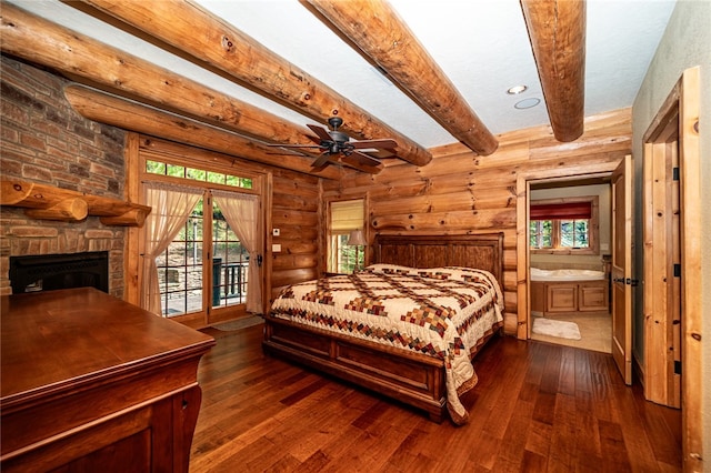 bedroom with beam ceiling, multiple windows, dark hardwood / wood-style floors, and access to exterior