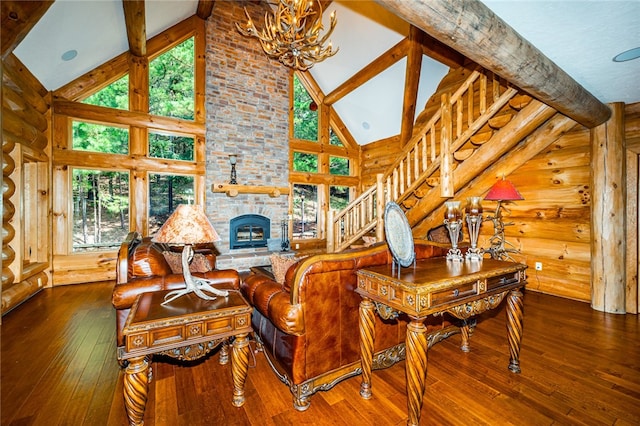 living room with high vaulted ceiling, beamed ceiling, and a fireplace