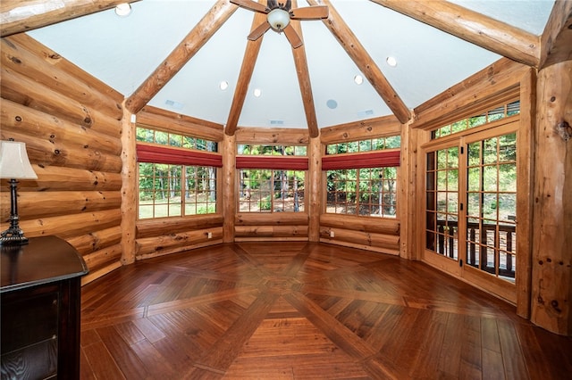 unfurnished sunroom featuring vaulted ceiling with beams and ceiling fan