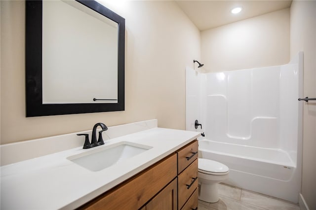 full bathroom featuring toilet, shower / tub combination, and vanity