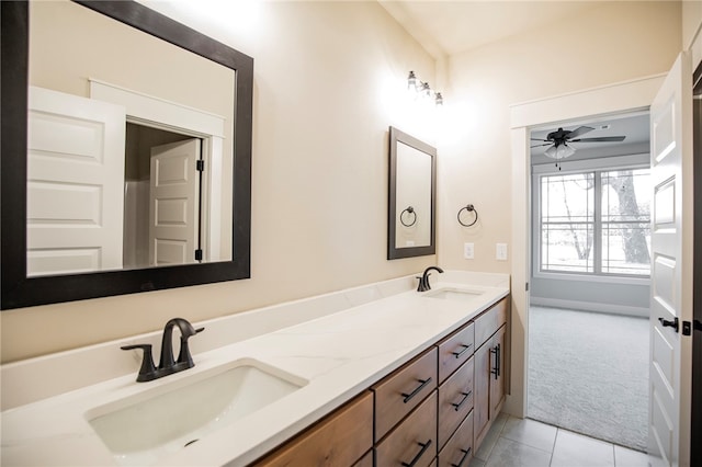 bathroom featuring vanity, tile patterned floors, and ceiling fan