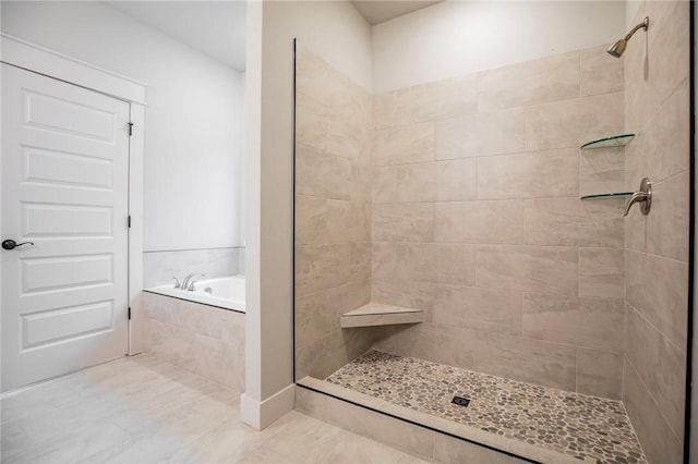 304 Doral Dr, Cave Springs, AR 72718 - bathroom featuring a garden tub and tiled shower