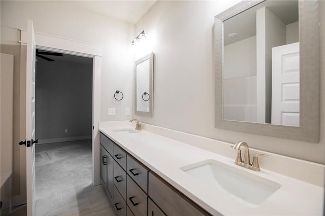 304 Doral Dr, Cave Springs, AR 72718 - full bath with baseboards, a sink, and double vanity