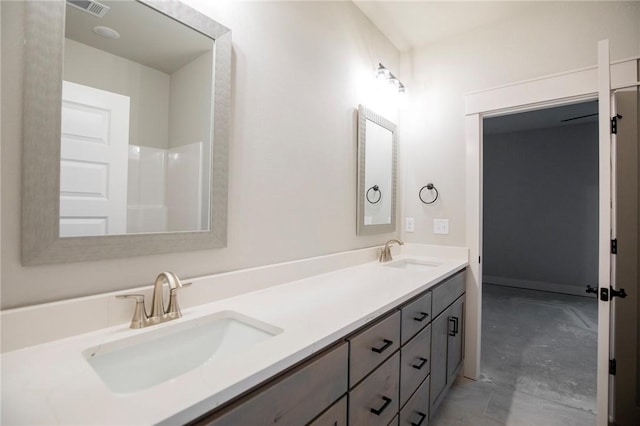 304 Doral Dr, Cave Springs, AR 72718 - bathroom featuring visible vents, a sink, and double vanity
