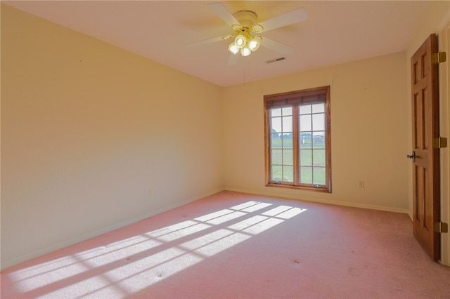 unfurnished bedroom featuring ceiling fan and light colored carpet