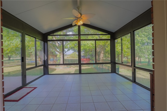 unfurnished sunroom with lofted ceiling and ceiling fan