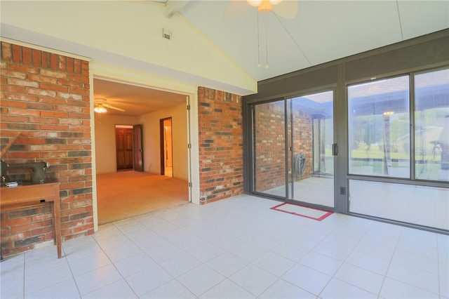 unfurnished room featuring ceiling fan, vaulted ceiling with beams, and light colored carpet