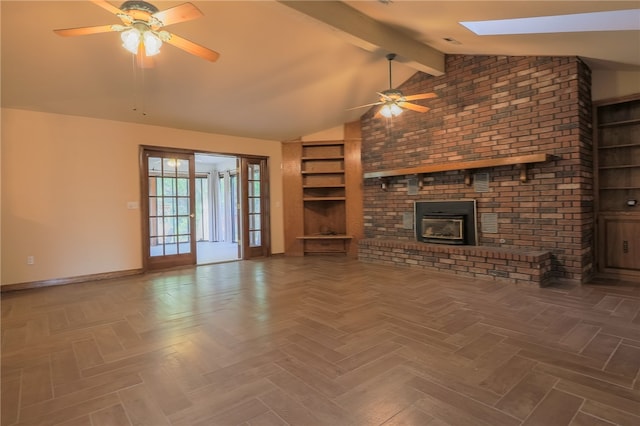 unfurnished living room with ceiling fan, a brick fireplace, parquet floors, and lofted ceiling with beams