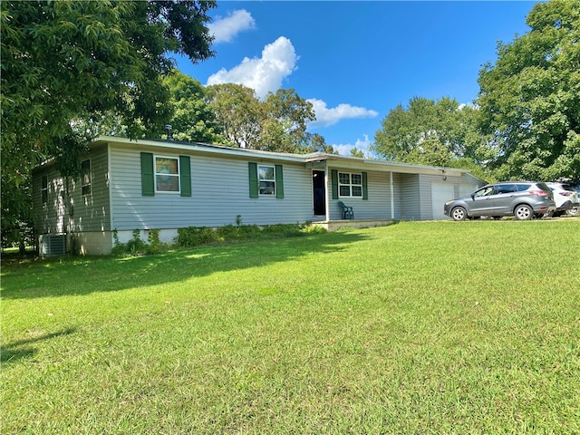 view of front of property featuring central AC and a front yard