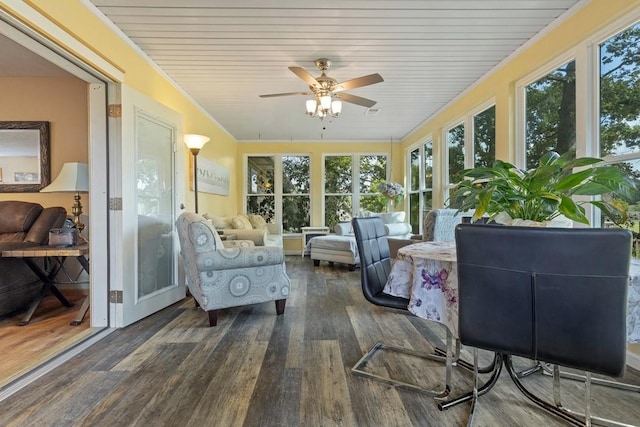 sunroom / solarium with wood ceiling and wood finished floors