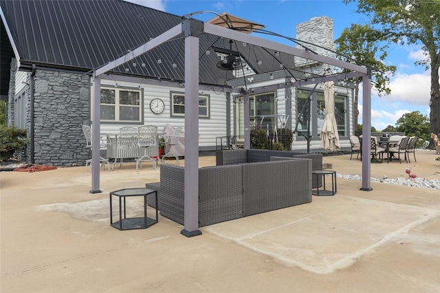 view of patio featuring an outdoor hangout area and a pergola