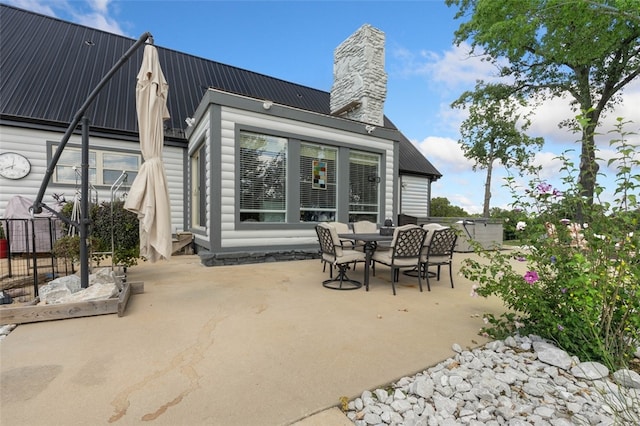 back of house featuring a patio