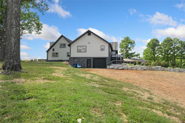 view of home's exterior with a yard