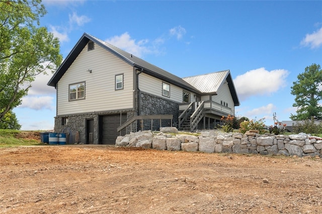 view of property exterior with a garage