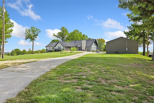 view of front of home with a front lawn