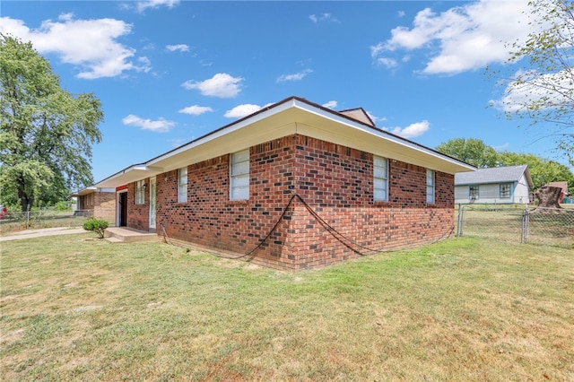 view of property exterior featuring a yard