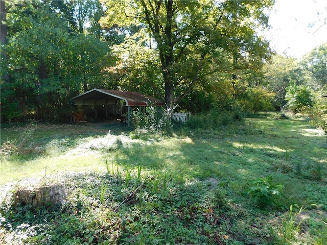 view of yard with a carport