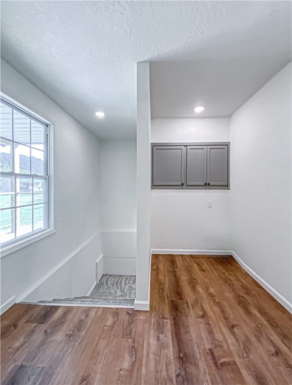 spare room featuring dark hardwood / wood-style floors