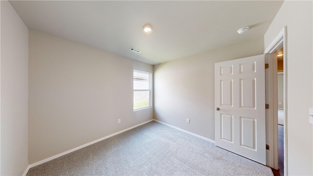 view of carpeted empty room