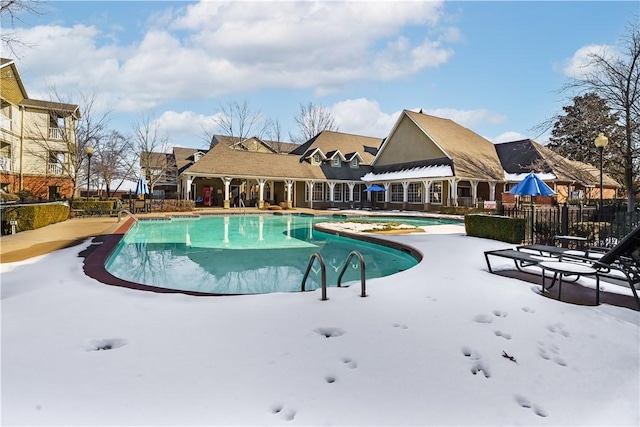 view of swimming pool featuring a patio area