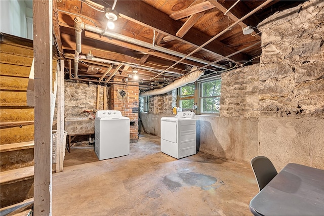 basement with washer and clothes dryer