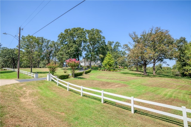 view of yard with a rural view