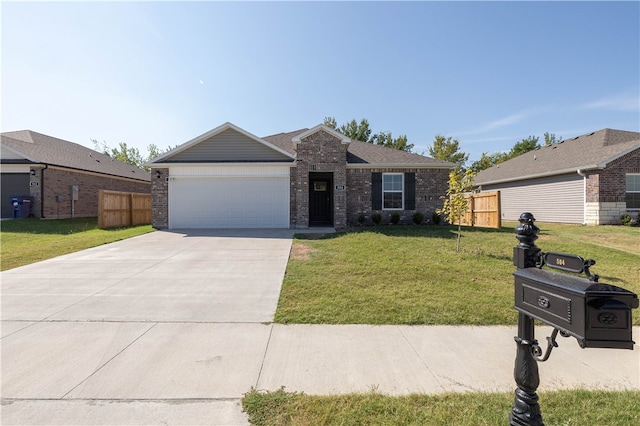 ranch-style home featuring a front yard and a garage