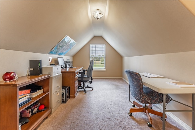 office space featuring light colored carpet and lofted ceiling