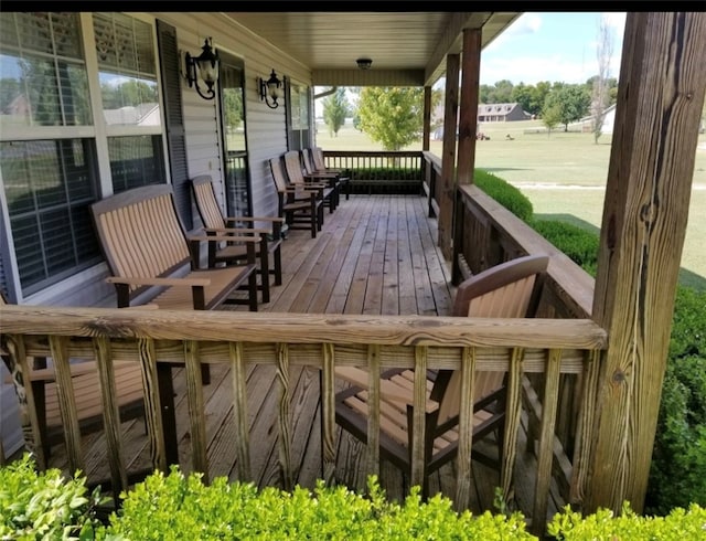 wooden terrace with covered porch