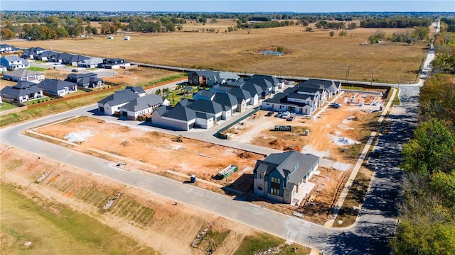 bird's eye view featuring a rural view and a residential view