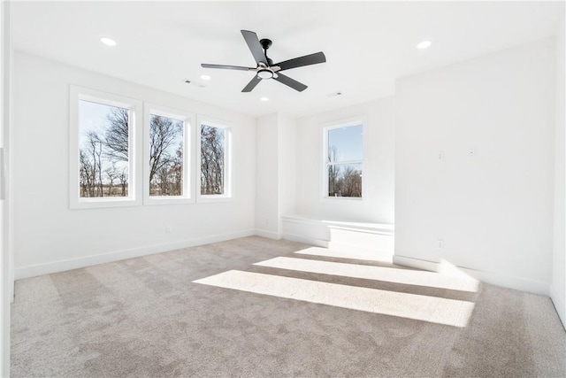 unfurnished room with recessed lighting, carpet, baseboards, and a ceiling fan