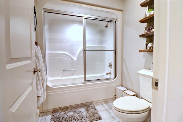 6532 Western Trails Dr, Springdale, AR 72762 - bathroom featuring toilet and bath / shower combo with glass door