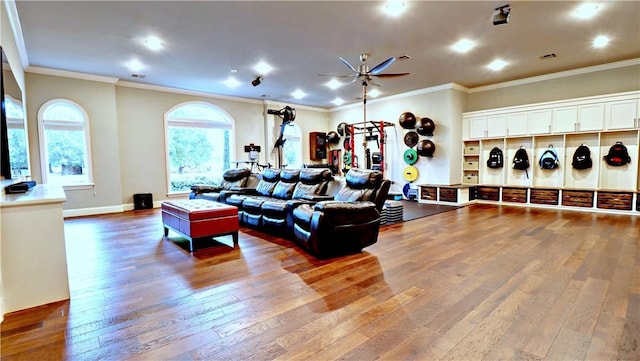 6532 Western Trails Dr, Springdale, AR 72762 - living area with crown molding, wood-type flooring, and a ceiling fan