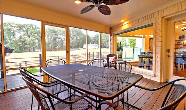 6532 Western Trails Dr, Springdale, AR 72762 - sunroom / solarium featuring ceiling fan and outdoor dining area