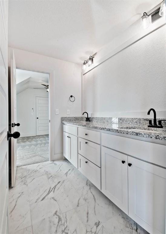 bathroom featuring vanity and ceiling fan