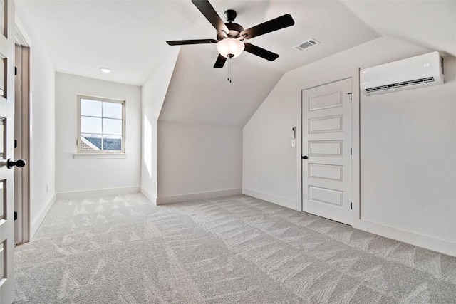 bonus room with light carpet, a wall unit AC, ceiling fan, and lofted ceiling