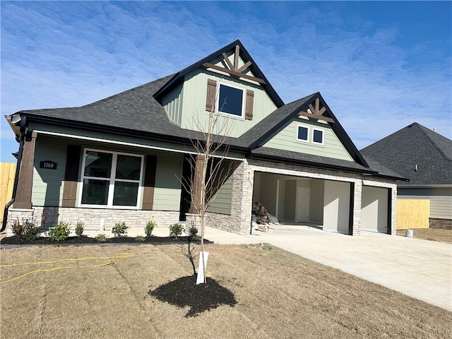 craftsman-style house featuring a garage