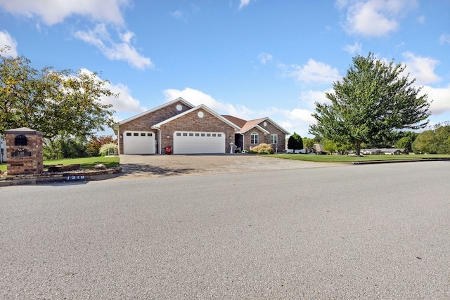 single story home with a garage