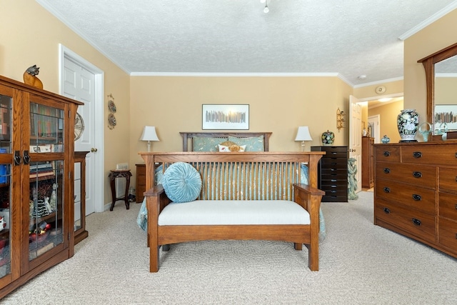 carpeted bedroom featuring a textured ceiling and crown molding