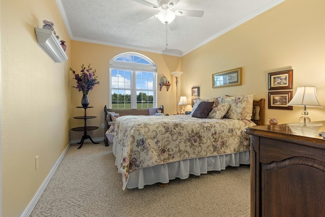 bedroom featuring ornamental molding, ceiling fan, light colored carpet, and a textured ceiling