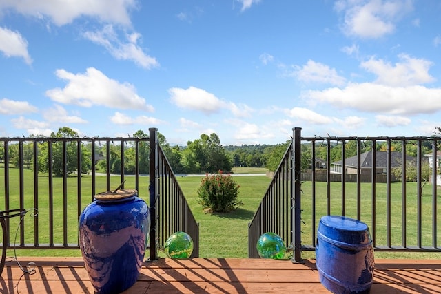 wooden deck with a yard