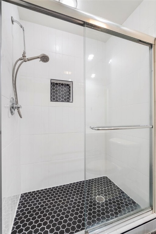 bathroom with a stall shower