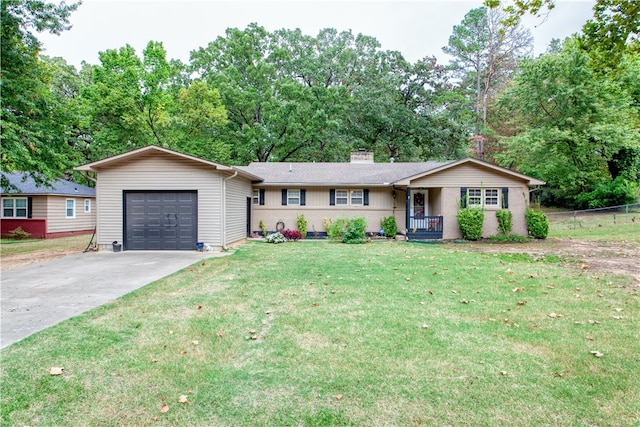 ranch-style home featuring a front lawn, a porch, and a garage