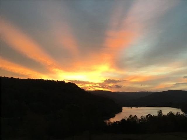 property view of mountains featuring a water view