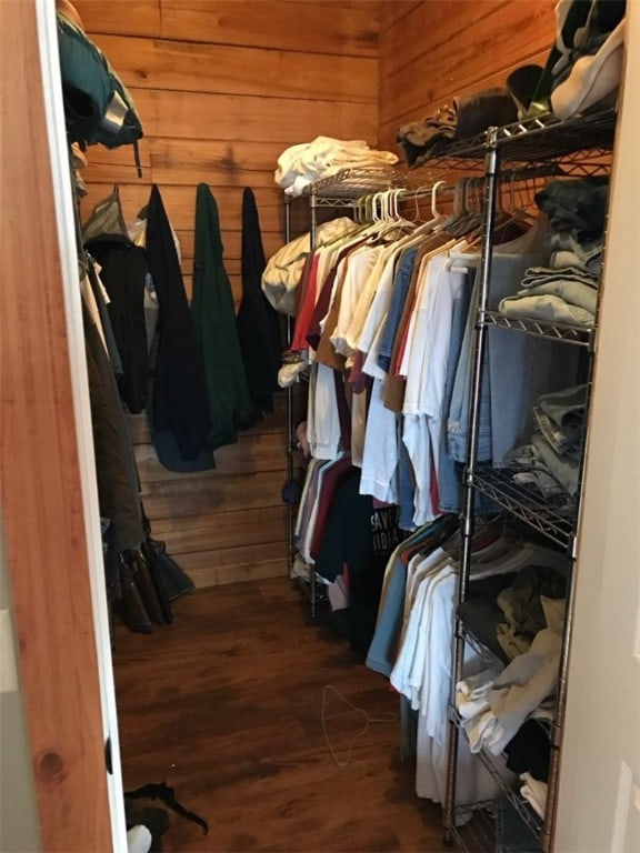 walk in closet featuring dark hardwood / wood-style floors