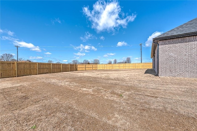 view of yard featuring fence